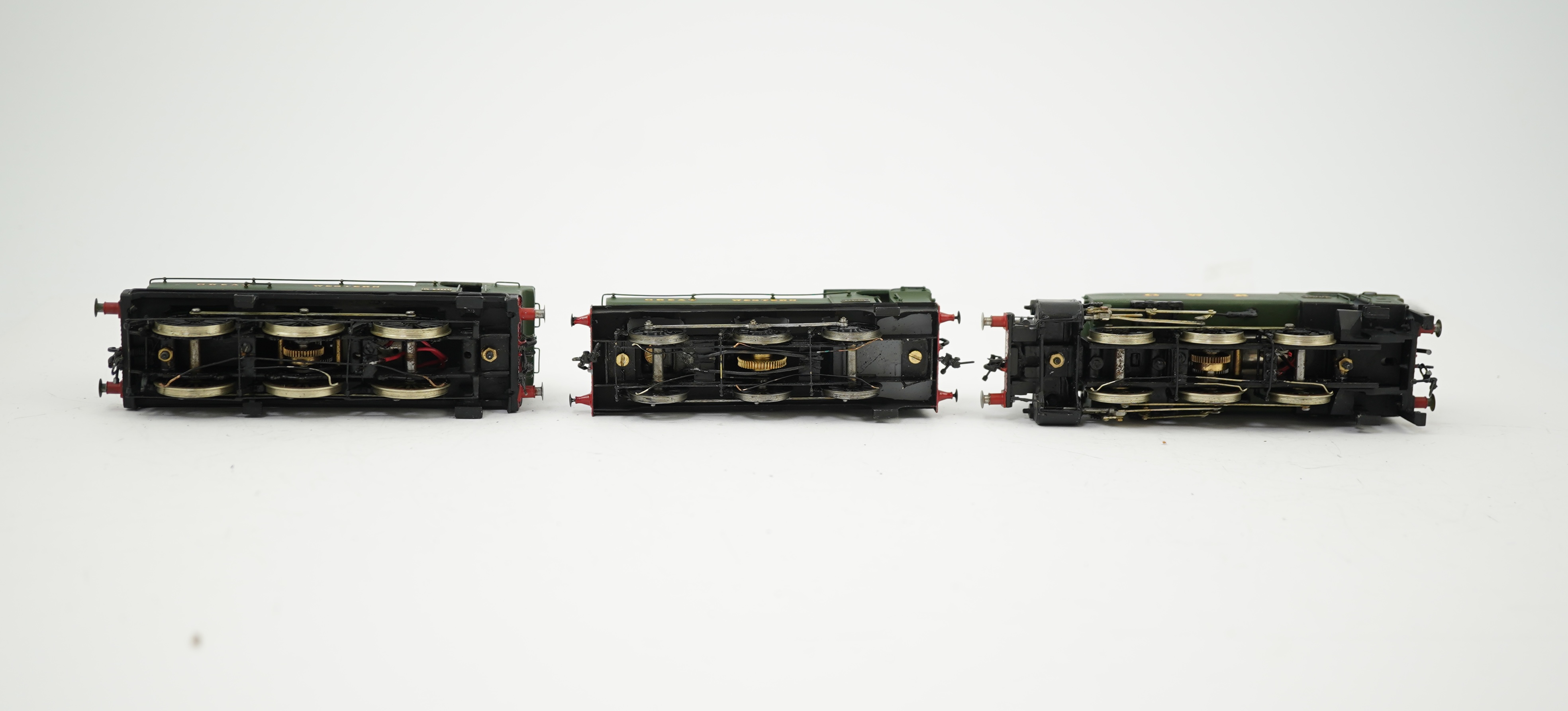 Three 00 gauge brass and white metal kit built GWR tank locomotives; a 15xx class 0-6-0T, 1500, together with an 54xx class 0-6-0PT, 5406, and a 19xx class 0-6-0PT, 1925, all constructed, painted and lined to a high stan